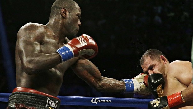 Deontay Wilder catches Eric Molina with a left during his successful world title defence.