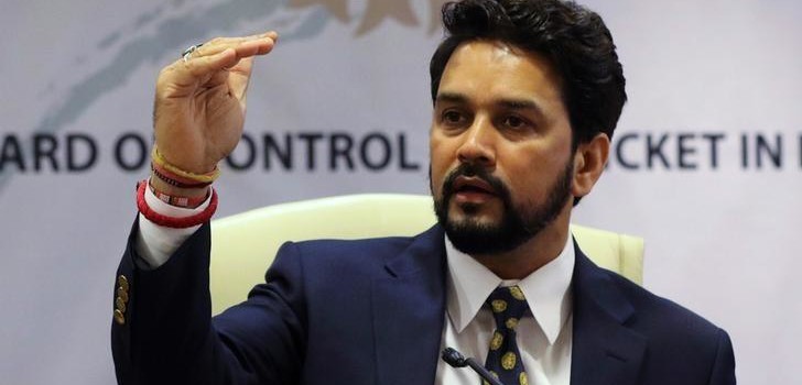 Thakur gestures during a news conference in Mumbai